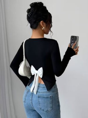 Long-Sleeve Black Top With Contrast White Oversized Bow